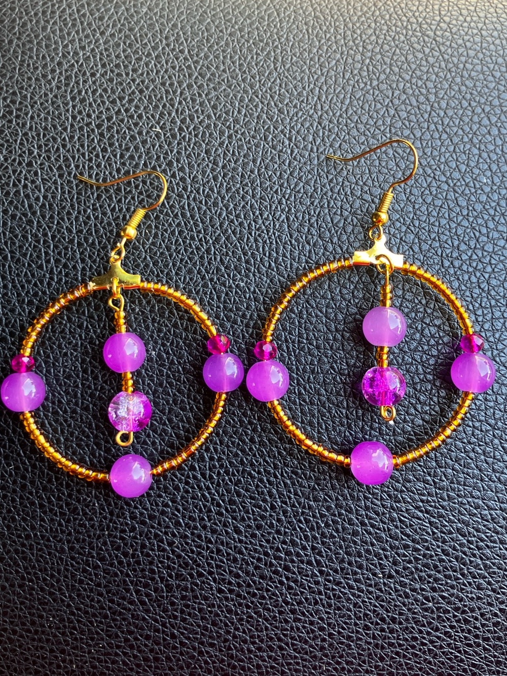 Purple and gold beaded and glass beaded hoop earrings
